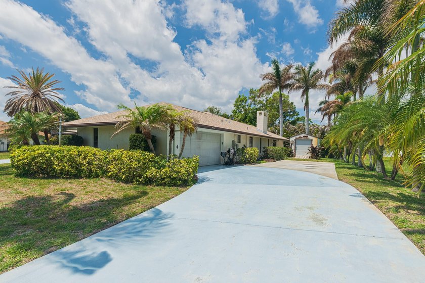 Tropical living awaits in Sandpiper Bay! Situated on an - photo 29