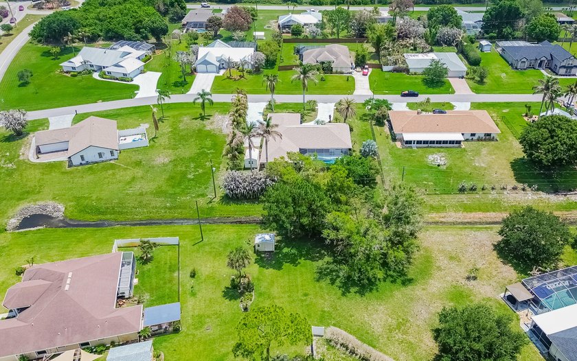 Tropical living awaits in Sandpiper Bay! Situated on an - photo 33