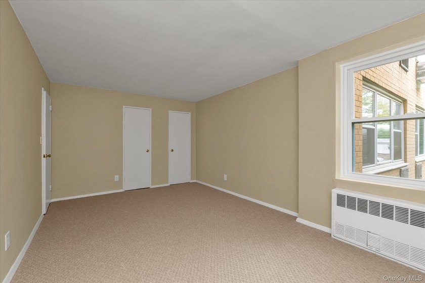 Experience modern comfort in this oversized one-bedroom COOP - photo 23
