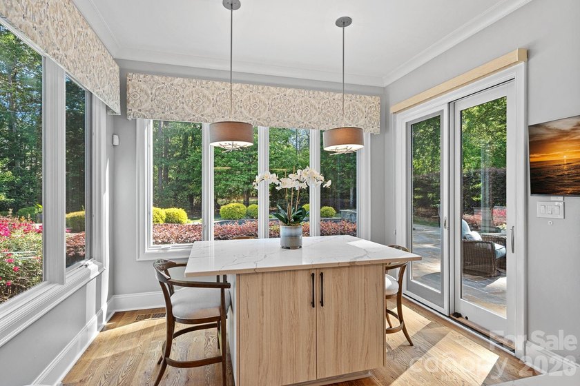 Set on a beautifully landscaped corner lot in a highly - photo 10