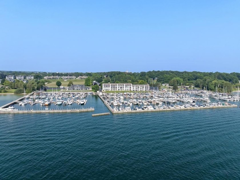 Welcome to one of Charlevoix's most coveted addresses. Perched - photo 32