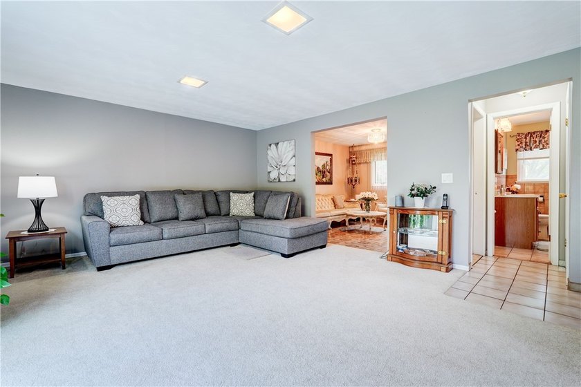 Welcome to this well-maintained split level home in Gates. Lots - photo 11