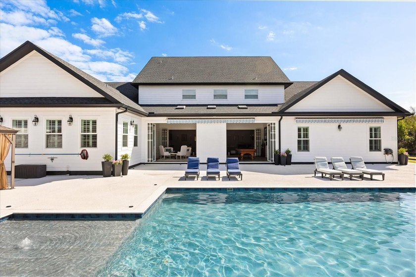 Three separate living quarters. Nearly five acres. Resort-style - photo 14