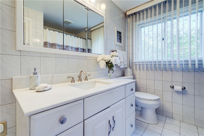 Welcome to this well-maintained split level home in Gates. Lots - photo 21