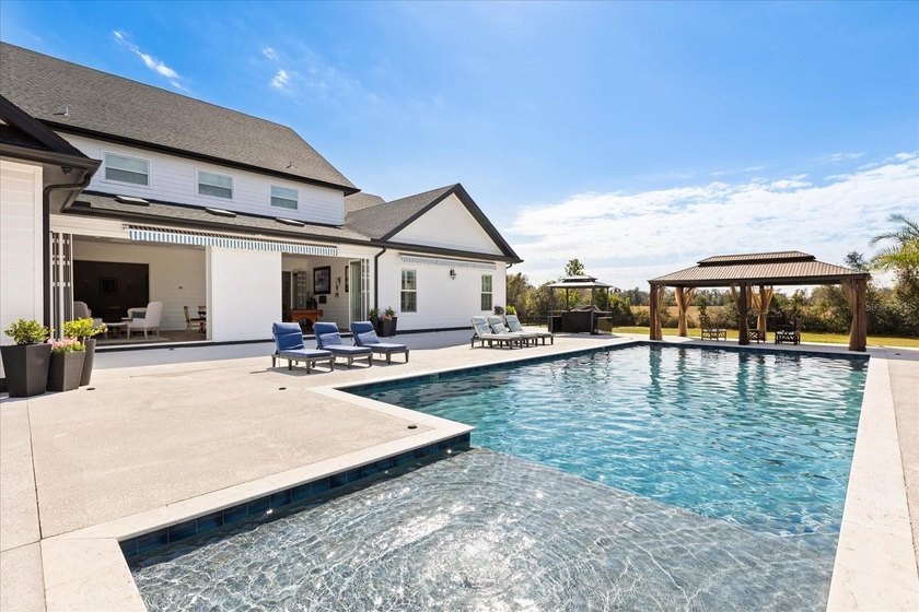 Three separate living quarters. Nearly five acres. Resort-style - photo 37