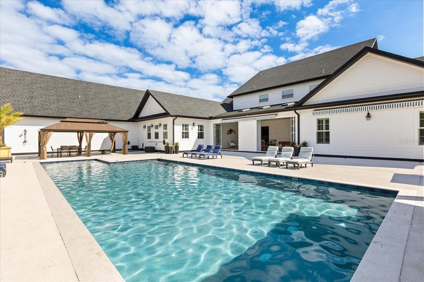 Three separate living quarters. Nearly five acres. Resort-style - photo 38