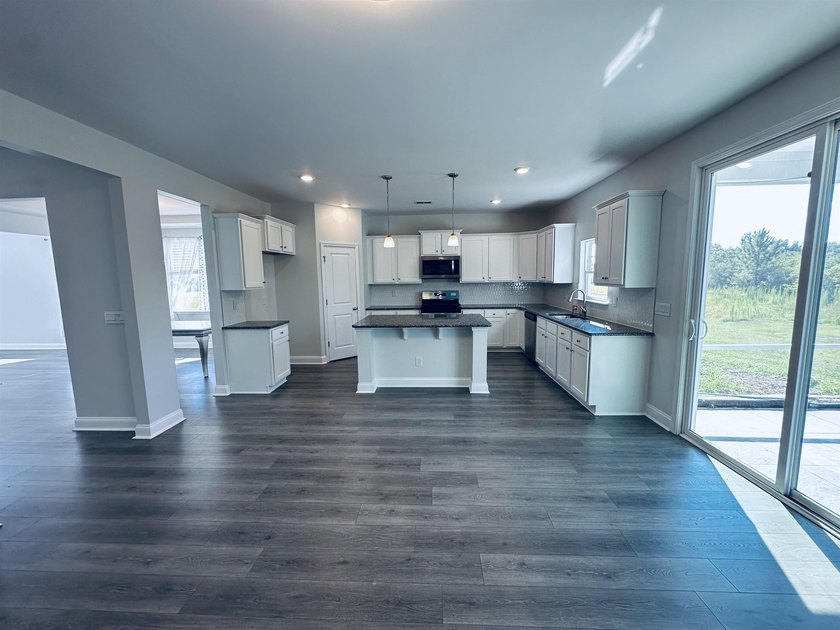 This Westerly home is a unique plan with a formal living and - photo 11