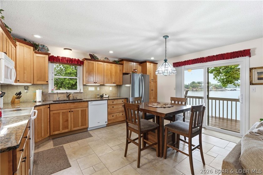 Discover the perfect blend of lakefront relaxation and - photo 13