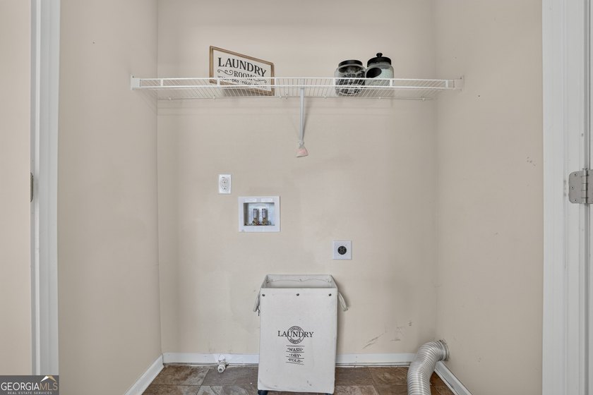 This charming 4-bedroom, 2.5-bath residence offers the ideal - photo 29