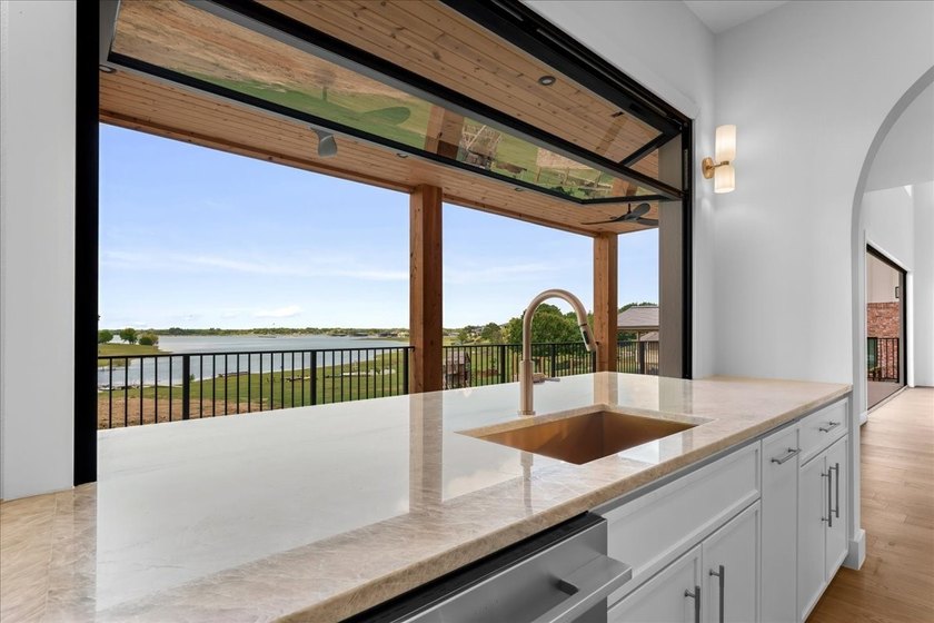 Experience extraordinary waterfront living in this stunning new - photo 12