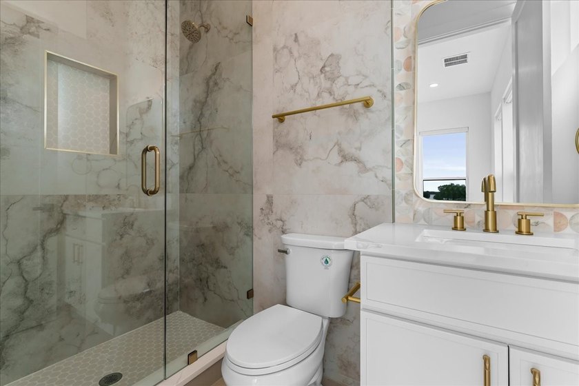 Experience extraordinary waterfront living in this stunning new - photo 28