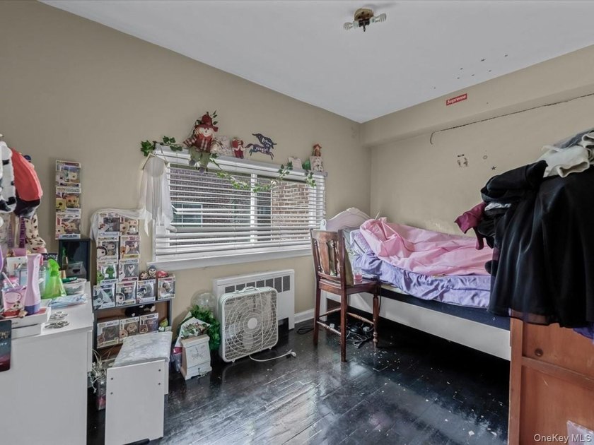 Large Brick 2-family in Pelham Bay. 2BR/1BA over 2BR/1BA over - photo 6