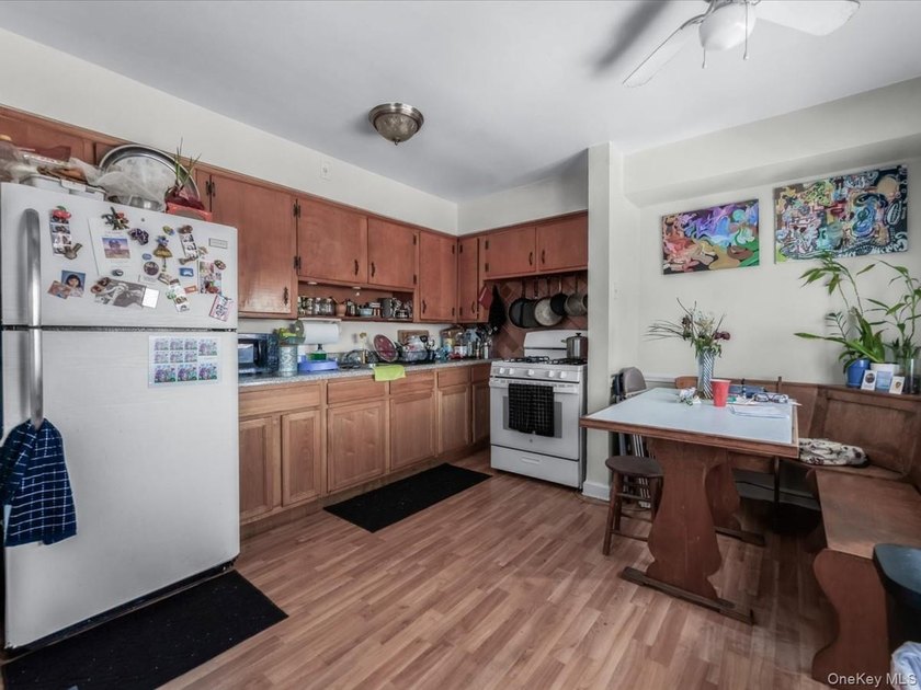 Large Brick 2-family in Pelham Bay. 2BR/1BA over 2BR/1BA over - photo 9