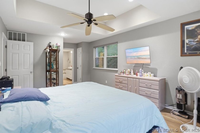 This stunning 4-bedroom, 3-bathroom lake home offers the perfect - photo 11