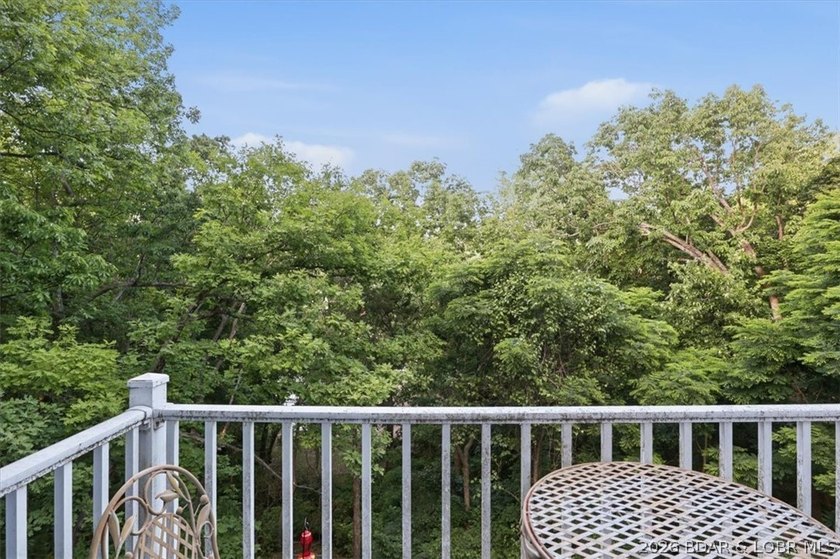 This stunning 4-bedroom, 3-bathroom lake home offers the perfect - photo 15