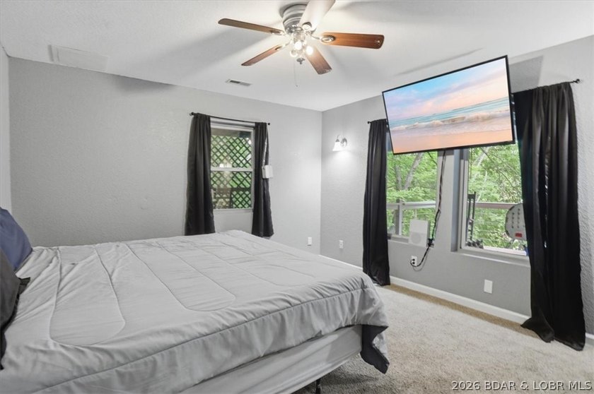 This stunning 4-bedroom, 3-bathroom lake home offers the perfect - photo 20