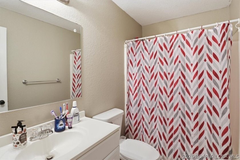 This stunning 4-bedroom, 3-bathroom lake home offers the perfect - photo 21