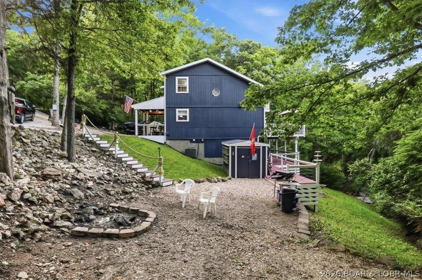 This stunning 4-bedroom, 3-bathroom lake home offers the perfect - photo 30