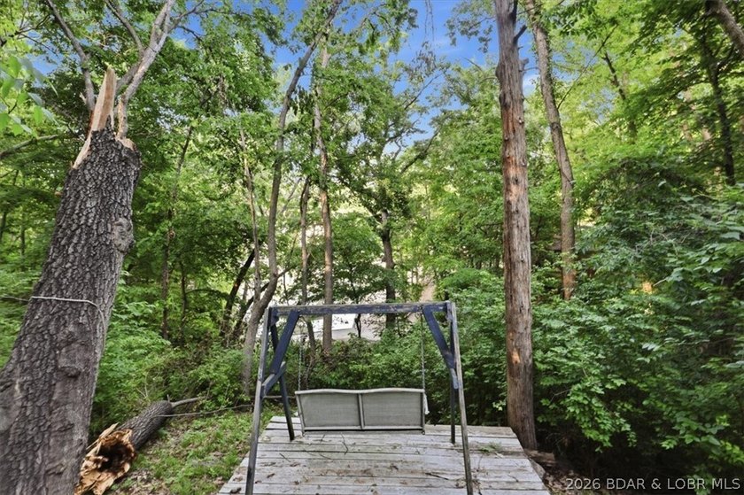 This stunning 4-bedroom, 3-bathroom lake home offers the perfect - photo 33