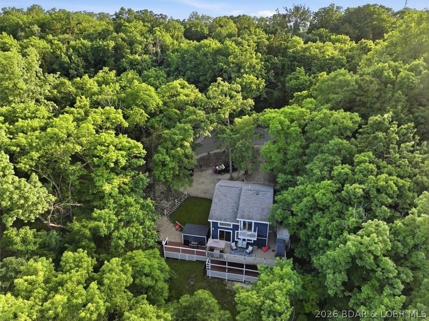 This stunning 4-bedroom, 3-bathroom lake home offers the perfect - photo 34