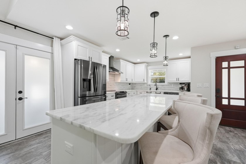 This beautifully updated home blends modern style with - photo 11