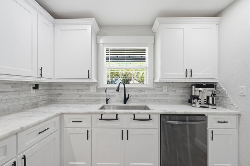 This beautifully updated home blends modern style with - photo 17
