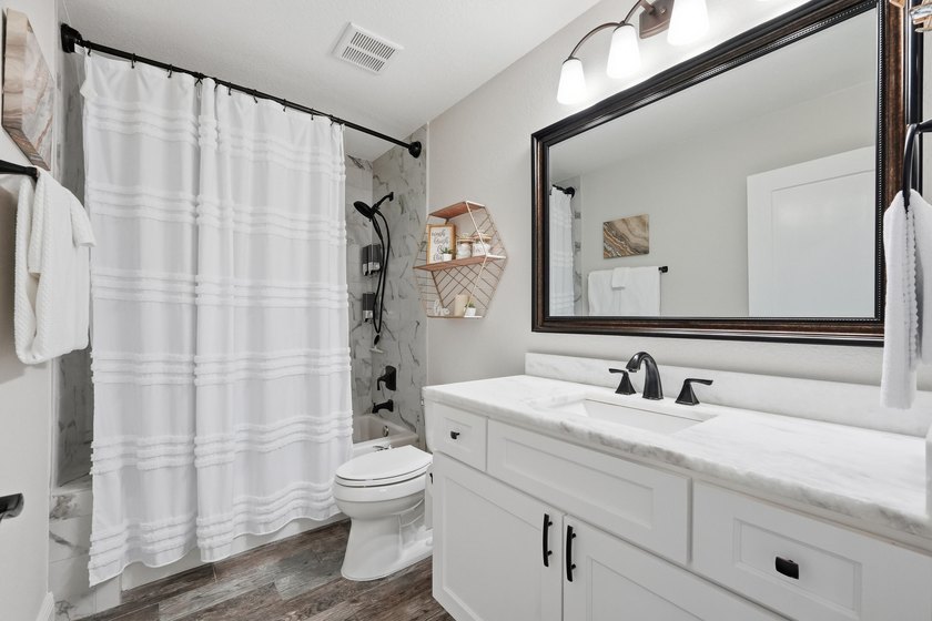 This beautifully updated home blends modern style with - photo 43