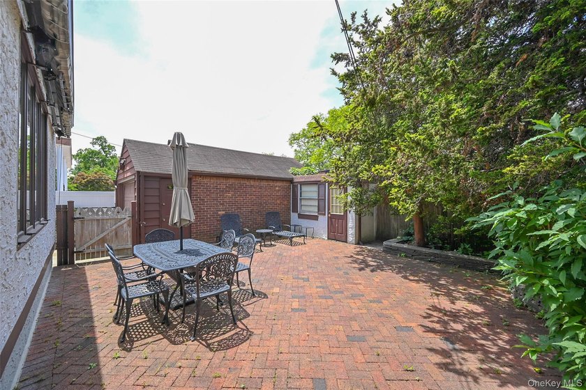 Welcome to this charming single-family residence nestled on a - photo 21