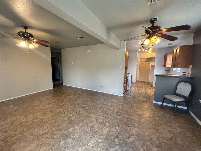 Opportunity awaits with this three-bedroom, two-bath home full - photo 4