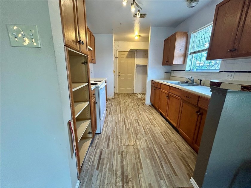 Opportunity awaits with this three-bedroom, two-bath home full - photo 5