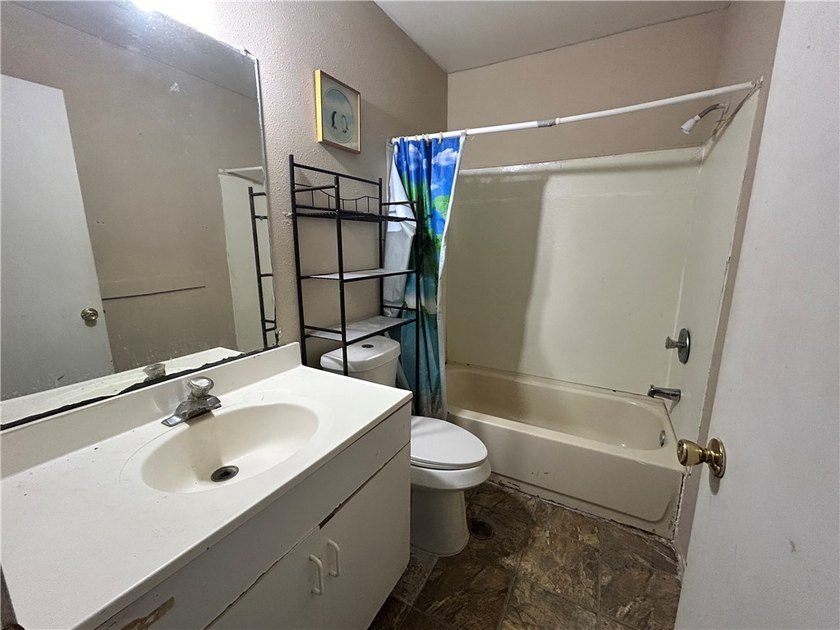 Opportunity awaits with this three-bedroom, two-bath home full - photo 7