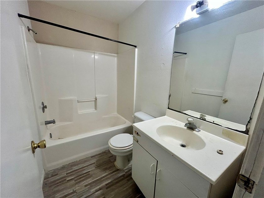Opportunity awaits with this three-bedroom, two-bath home full - photo 9