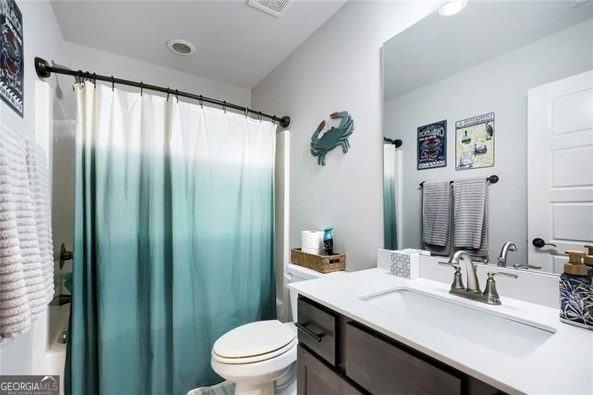 Welcome home to 115 Rowboat Drive, a gorgeous craftsman tucked - photo 19