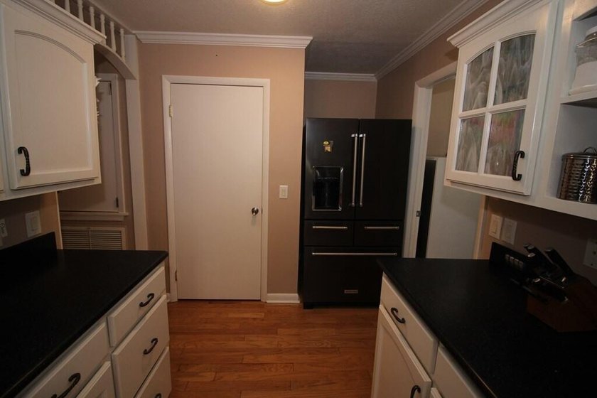 Tucked away in a quiet, private setting, this move-in-ready home - photo 13