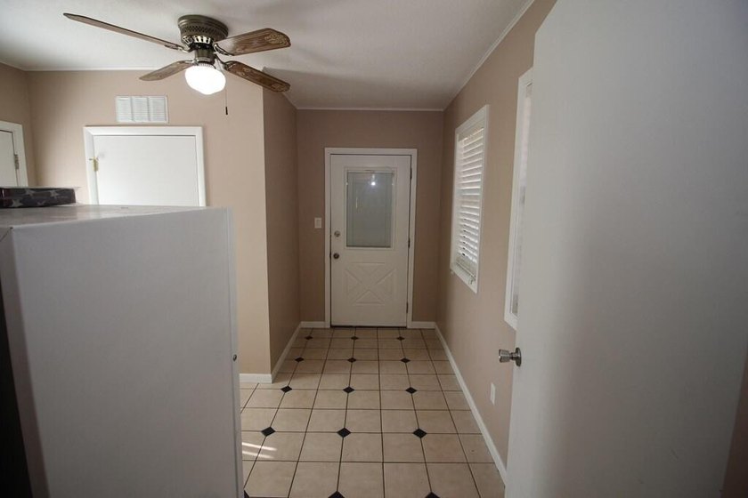 Tucked away in a quiet, private setting, this move-in-ready home - photo 18
