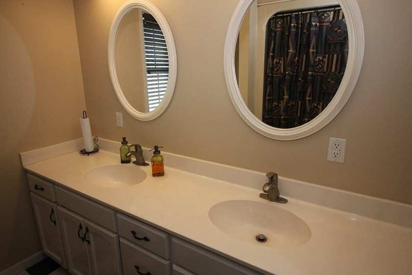 Tucked away in a quiet, private setting, this move-in-ready home - photo 21