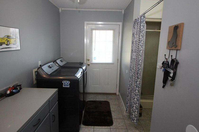 Tucked away in a quiet, private setting, this move-in-ready home - photo 31