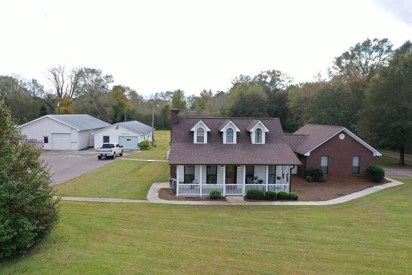 Tucked away in a quiet, private setting, this move-in-ready home - photo 50