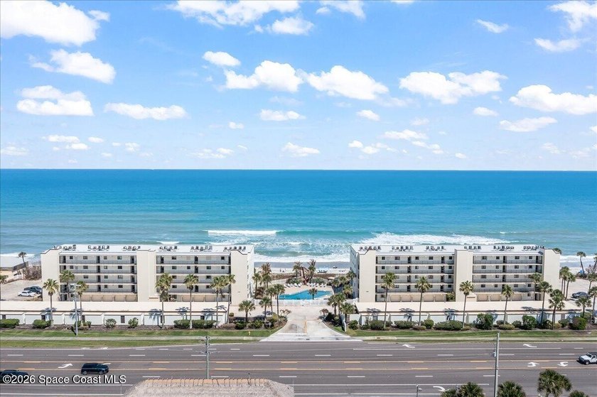 Welcome Home to the ultimate in Coastal Living with this fully - photo 2