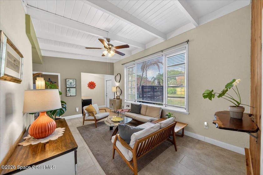 This charming mid-century, 3-bedroom home sits proudly on a - photo 8