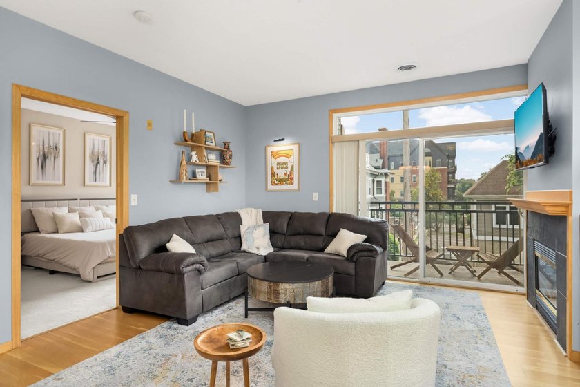 This beautifully updated end-unit condo is filled with natural - photo 14
