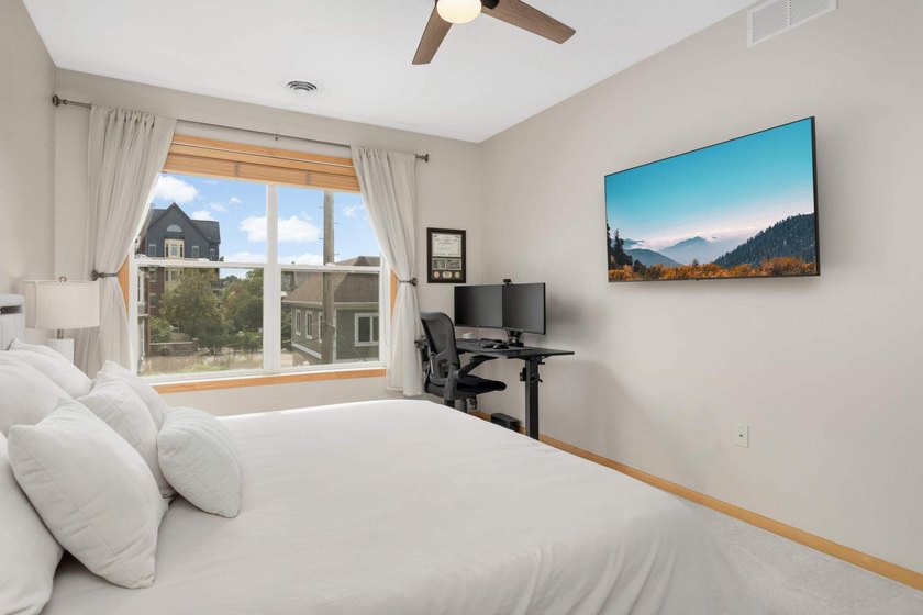 This beautifully updated end-unit condo is filled with natural - photo 16
