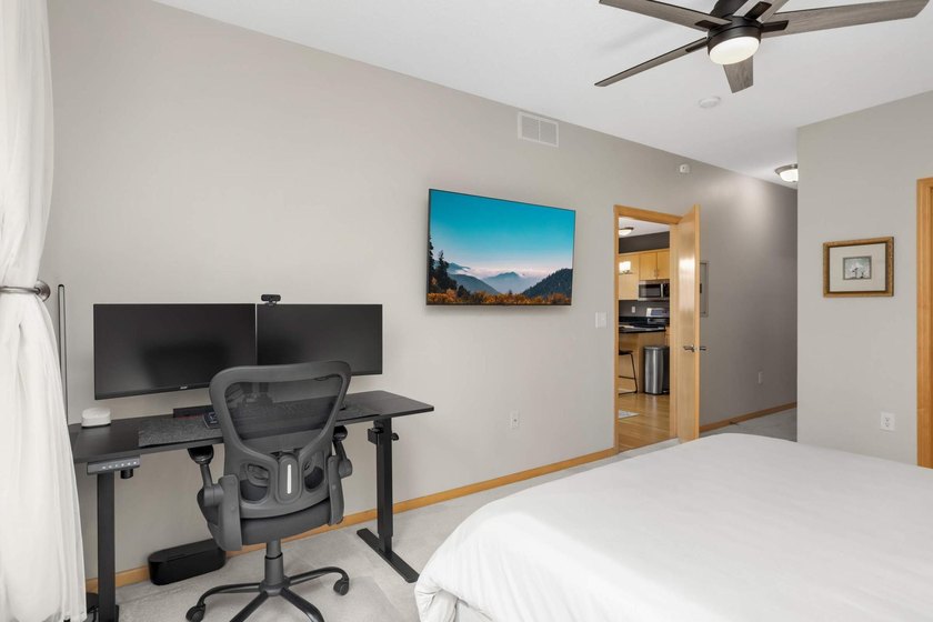 This beautifully updated end-unit condo is filled with natural - photo 17