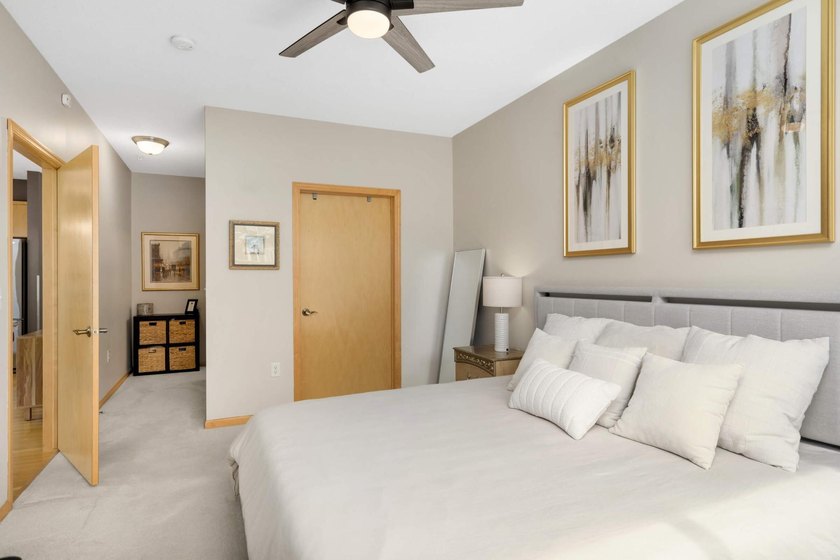 This beautifully updated end-unit condo is filled with natural - photo 18