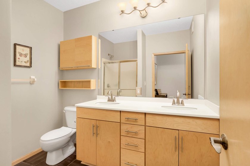 This beautifully updated end-unit condo is filled with natural - photo 19