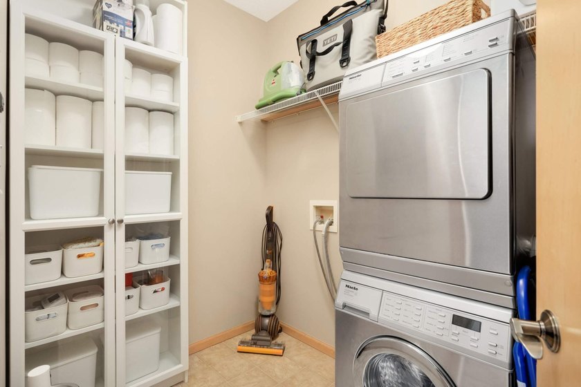 This beautifully updated end-unit condo is filled with natural - photo 23