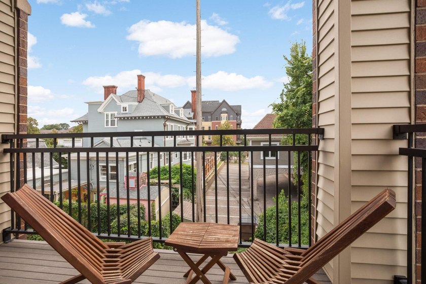 This beautifully updated end-unit condo is filled with natural - photo 24