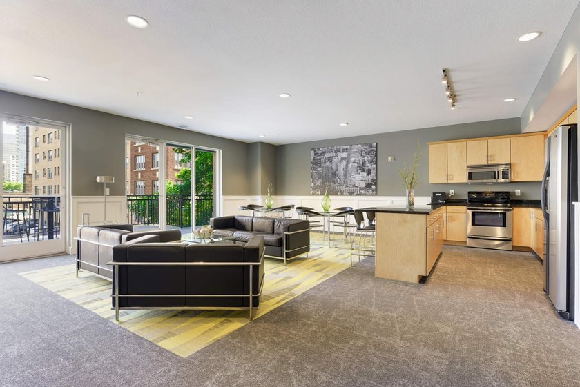 This beautifully updated end-unit condo is filled with natural - photo 27