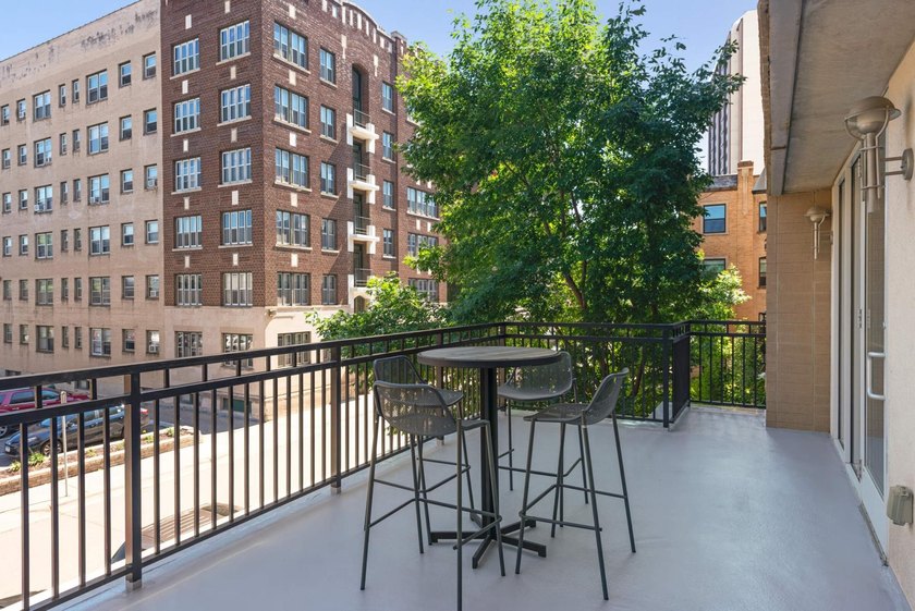 This beautifully updated end-unit condo is filled with natural - photo 32