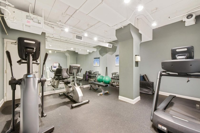 This beautifully updated end-unit condo is filled with natural - photo 33